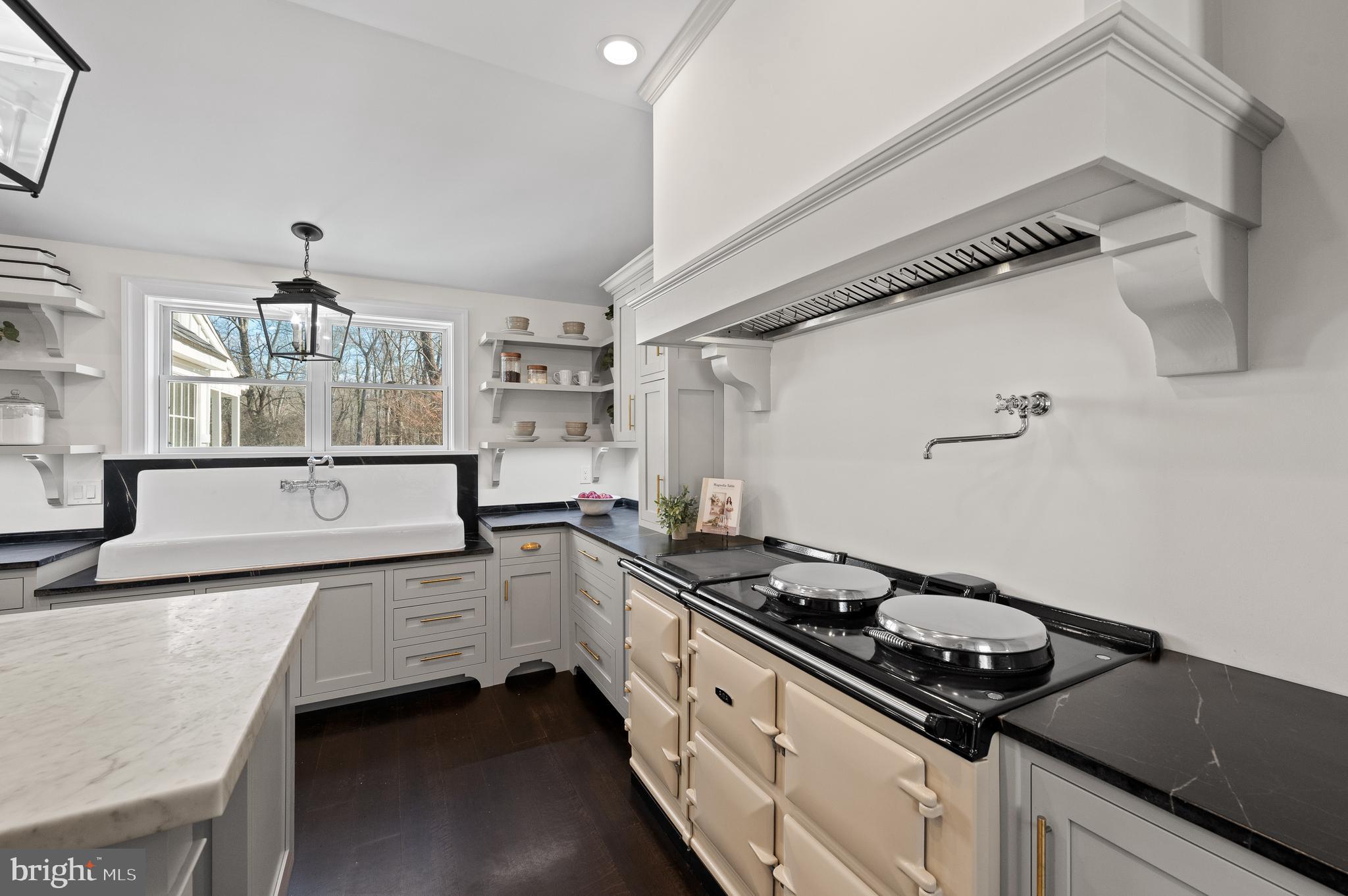 115 Jaffrey Road Malvern, PA 19355 - Photo 8 of 46 a kitchen that has a sink and a stove