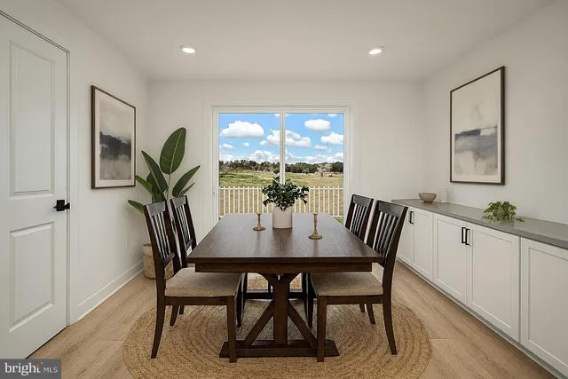 a view of a livingroom with wooden floor