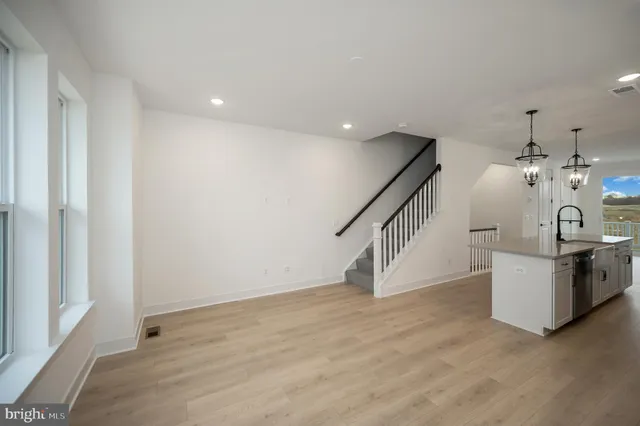a view of a balcony with wooden floor
