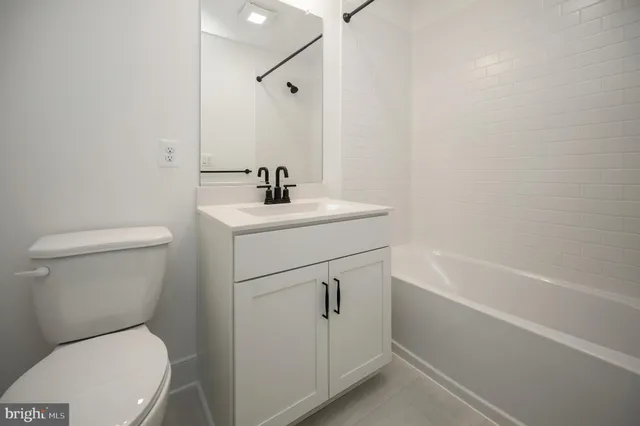 a view of an house with a street