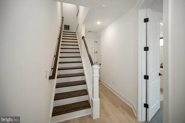 a view of an entryway with stairs