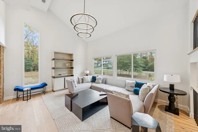 a large kitchen with stainless steel appliances kitchen island a refrigerator sink and cabinets