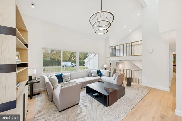 a room with furniture and a large window