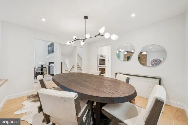 a living room with furniture fireplace and flat screen tv
