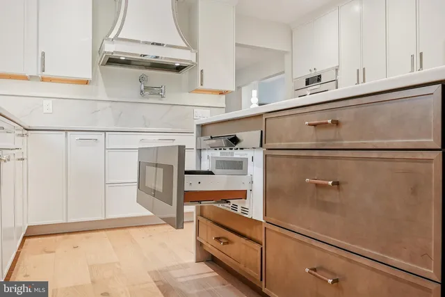 a bathroom with a bath tub and a shower