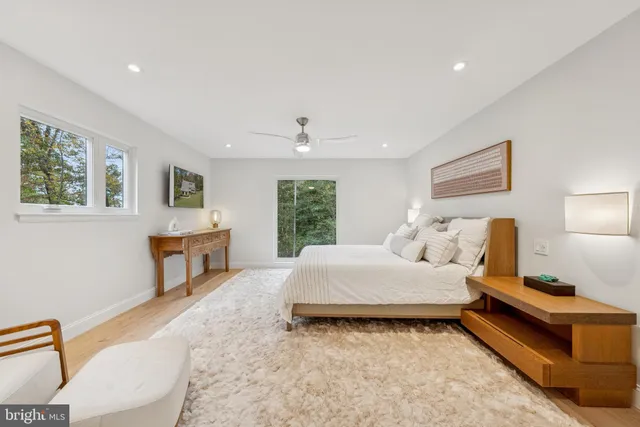a view of a deck with a table and chairs
