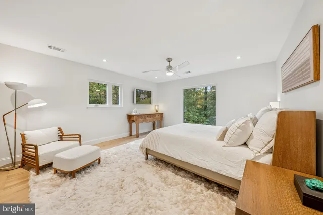 a view of a chair and table on the wooden floor