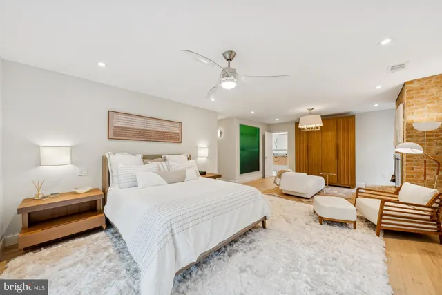 a view of two chairs in the balcony