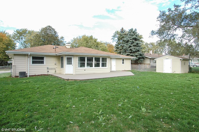 425 Bode Road Hoffman Estates, IL 60169 - Photo 11 of 11 a view of a house with a backyard