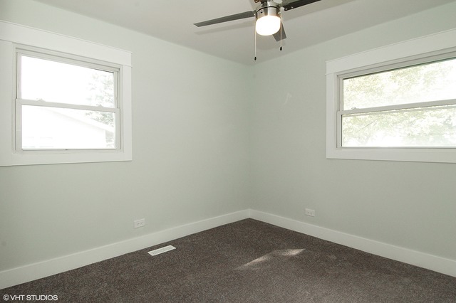 425 Bode Road Hoffman Estates, IL 60169 - Photo 10 of 11 an empty room with a window