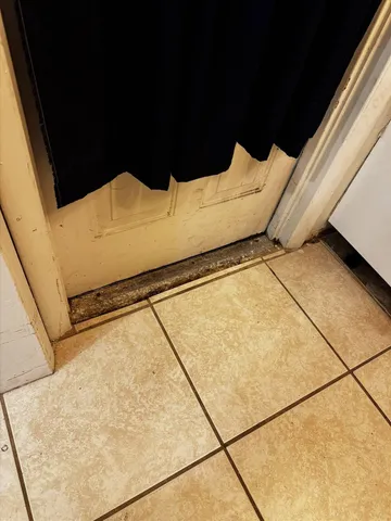 a kitchen with stainless steel appliances granite countertop a stove and a refrigerator