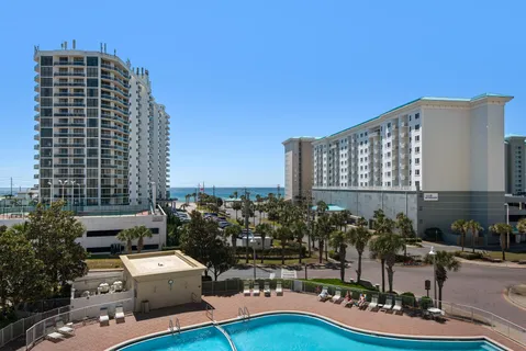 a front view of a building with outdoor space