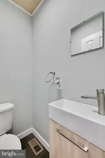 a bathroom with a sink and a toilet