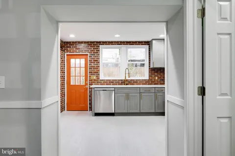 a kitchen with a window and a sink