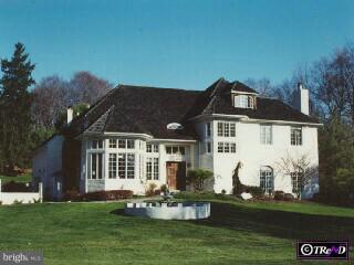 1235 Farview Road Villanova, PA 19085 - Photo 1 of 1 a front view of a house with a yard