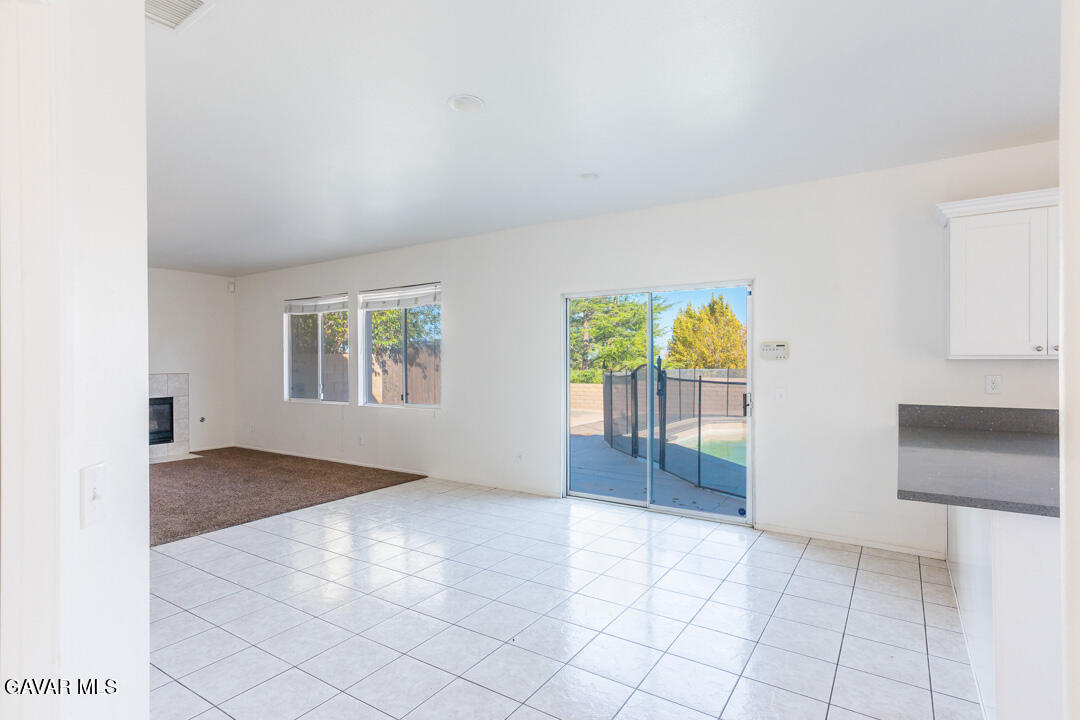 38318 Wakefield Place Palmdale, CA 93551 - Photo 12 of 33 an empty room with windows