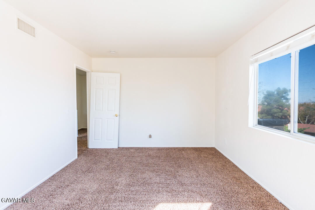 38318 Wakefield Place Palmdale, CA 93551 - Photo 17 of 33 a view of an empty room