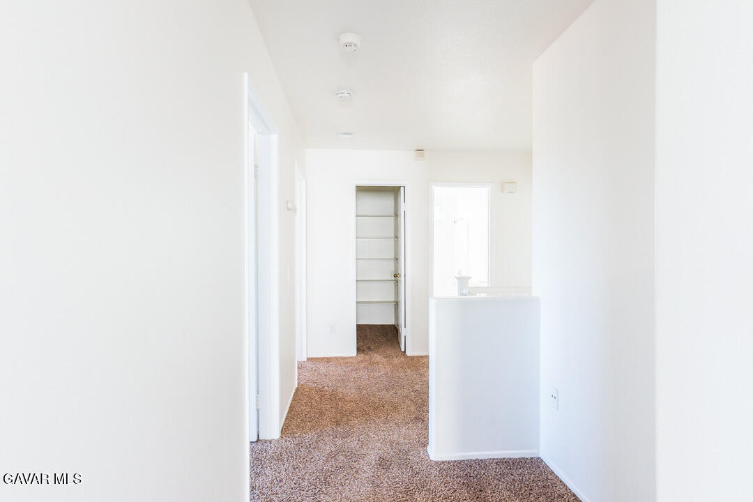 38318 Wakefield Place Palmdale, CA 93551 - Photo 25 of 33 a view of an empty room with closet