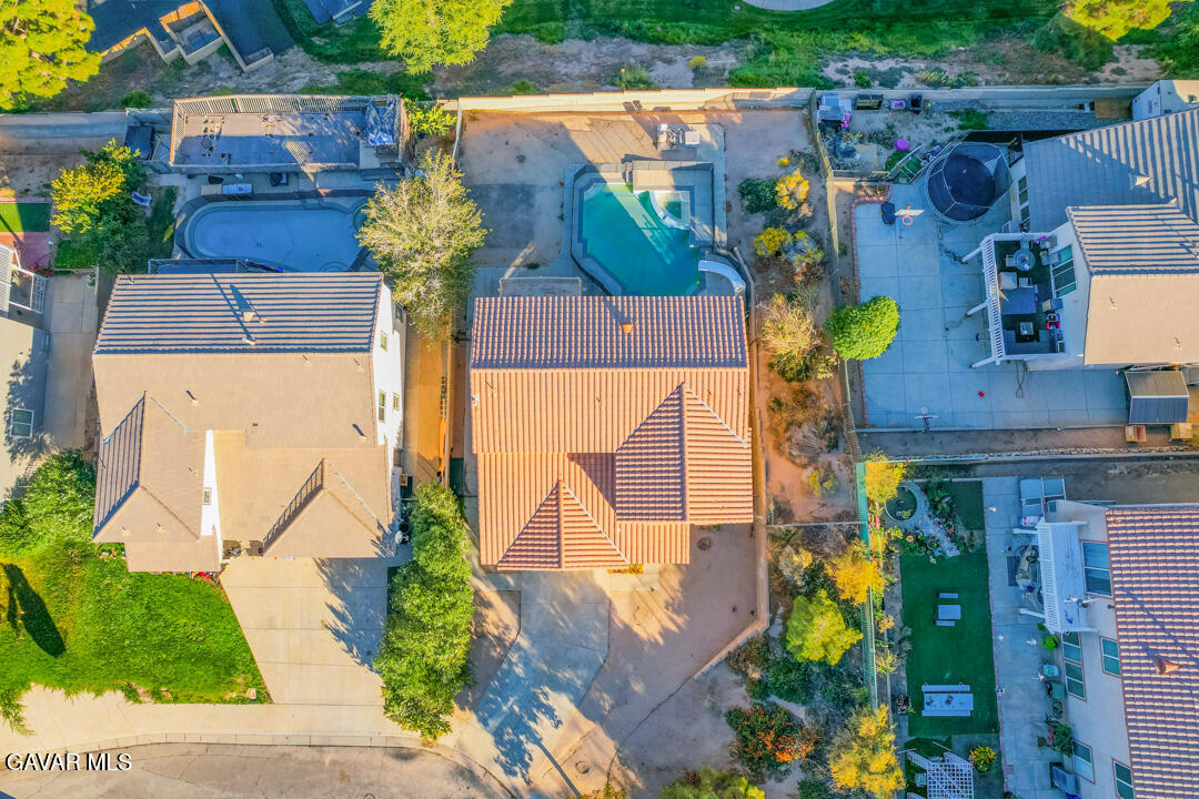 38318 Wakefield Place Palmdale, CA 93551 - Photo 33 of 33 an aerial view of residential houses with outdoor space