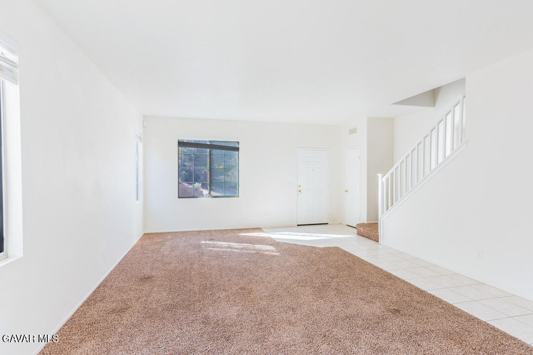 38318 Wakefield Place Palmdale, CA 93551 - Photo 6 of 33 a view of an empty room with a window