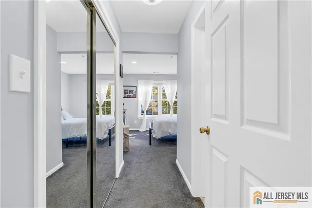 a view of a bedroom with tub