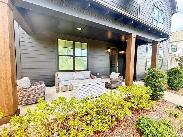 a view of a lobby with chair and tables