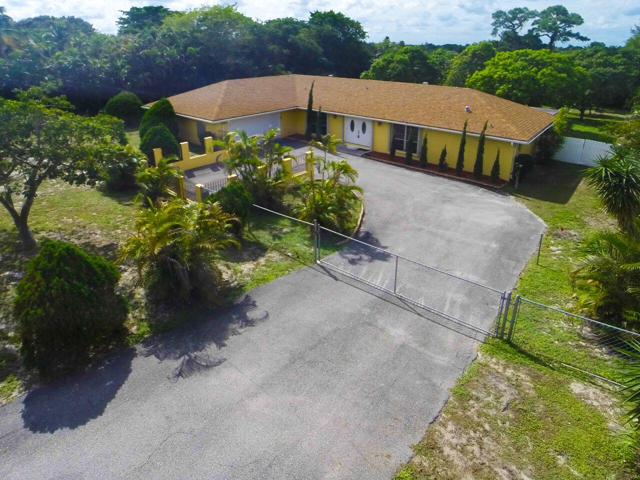 6763 High Ridge Road Lake Worth, FL 33462 - Photo 1 of 43 Front