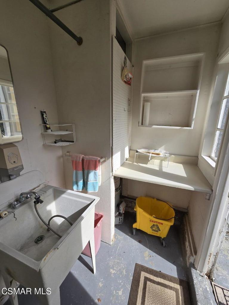 17526 Miranda Street Encino, CA 91316 - Photo 19 of 28 a bathroom with a sink toilet and mirror