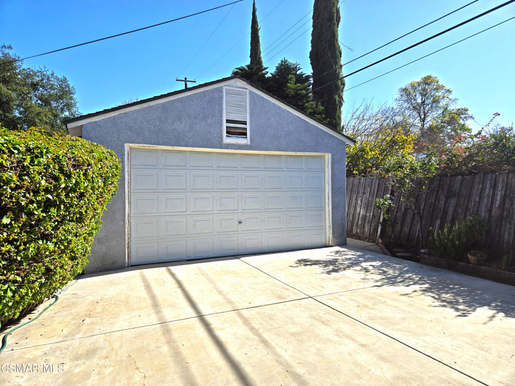 17526 Miranda Street Encino, CA 91316 - Photo 23 of 28 a brick house with tree in front of it