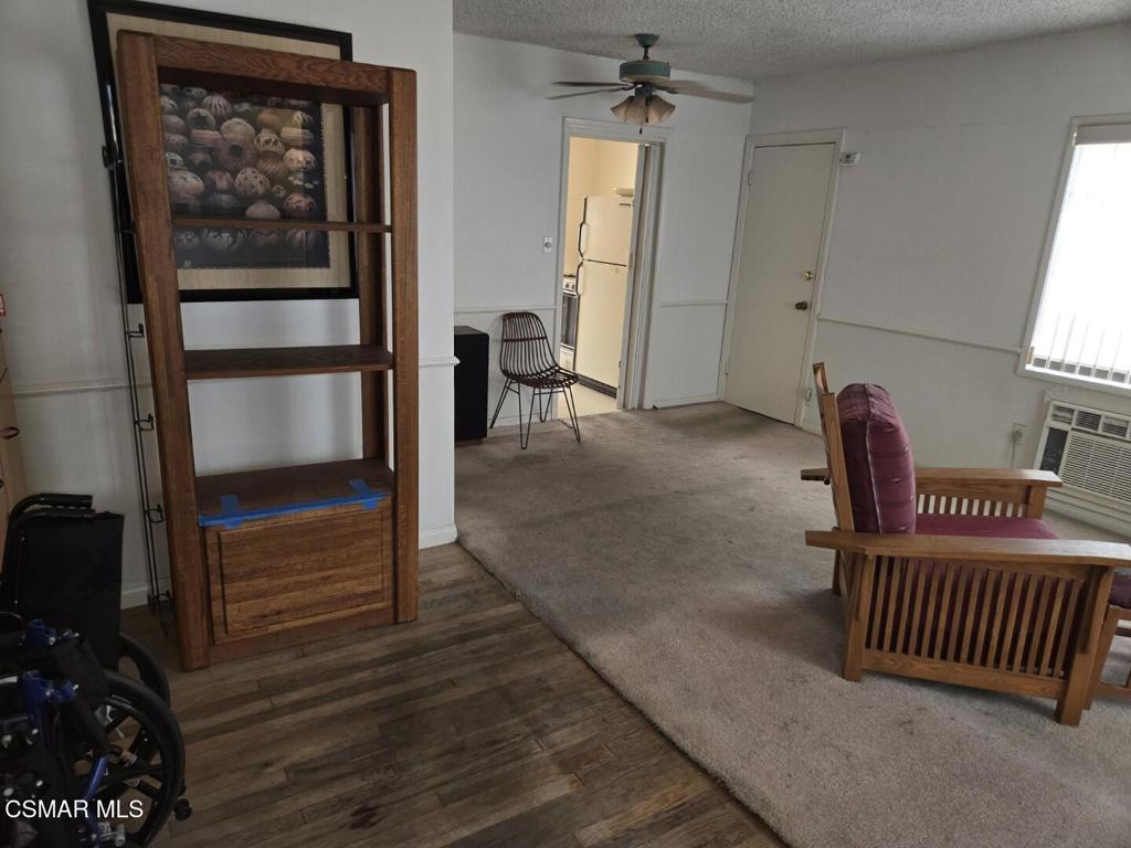 17526 Miranda Street Encino, CA 91316 - Photo 5 of 28 a view of a livingroom with furniture and windows