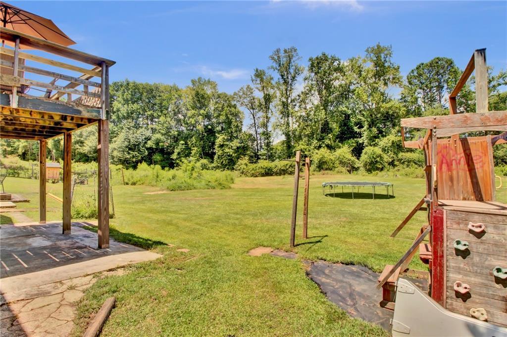 4947 Holbrook Circle Northwest Duluth, GA 30096 - Photo 22 of 26 a view of a swimming pool with an outdoor space