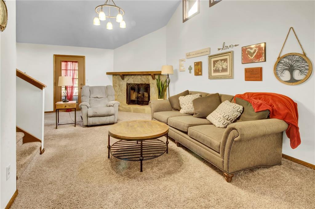 4947 Holbrook Circle Northwest Duluth, GA 30096 - Photo 3 of 26 a living room with furniture and a fireplace