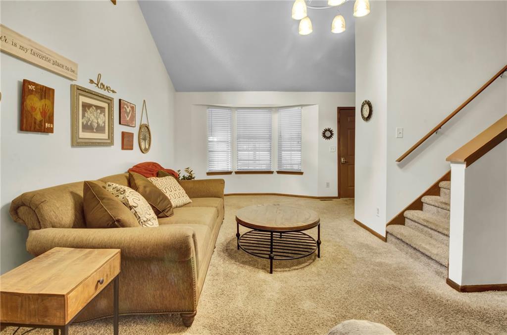 4947 Holbrook Circle Northwest Duluth, GA 30096 - Photo 5 of 26 a living room with furniture and a wooden floor