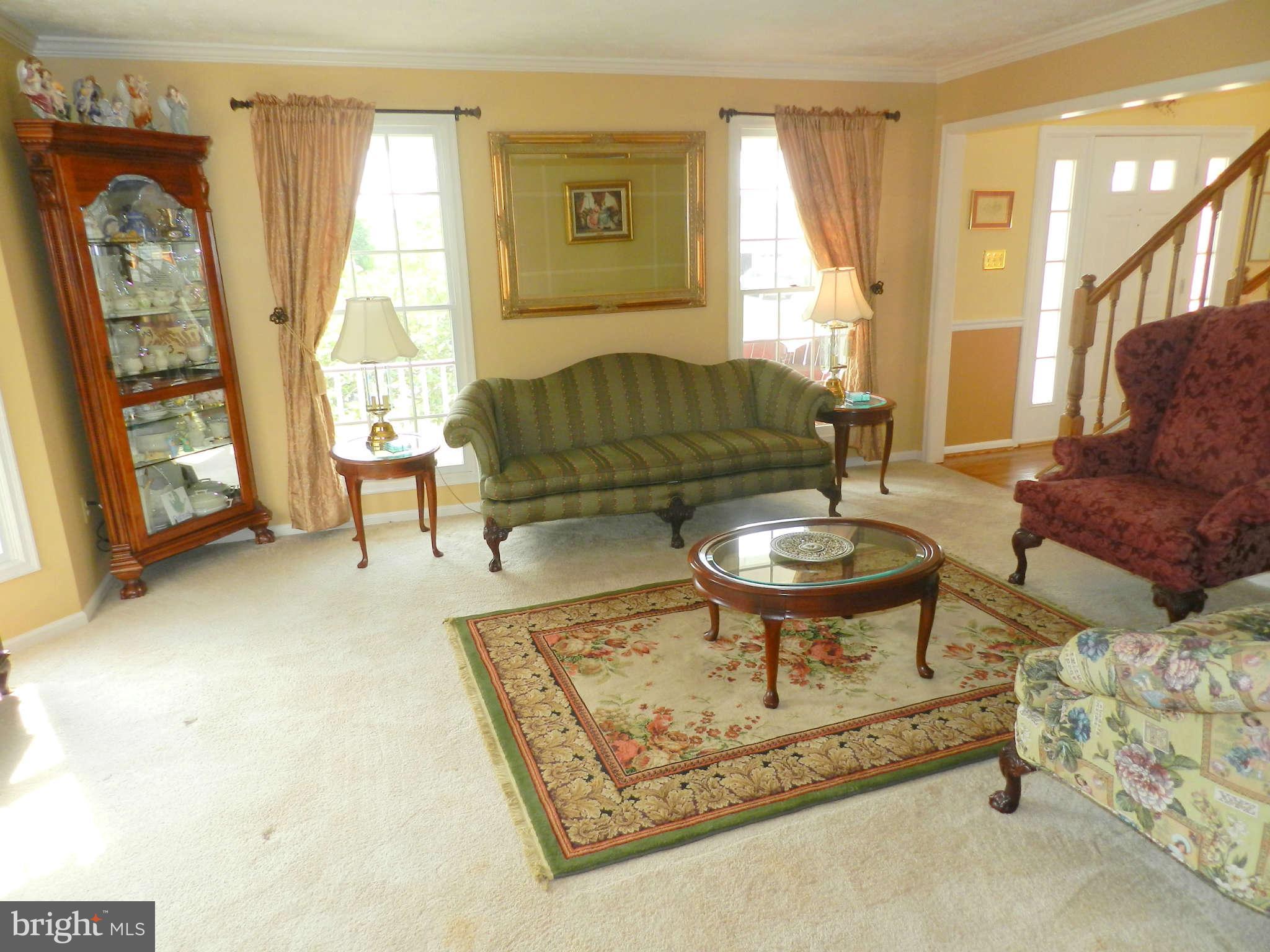 17224 Spates Hill Road Poolesville, MD 20837 - Photo 14 of 30 a living room with furniture and a large window