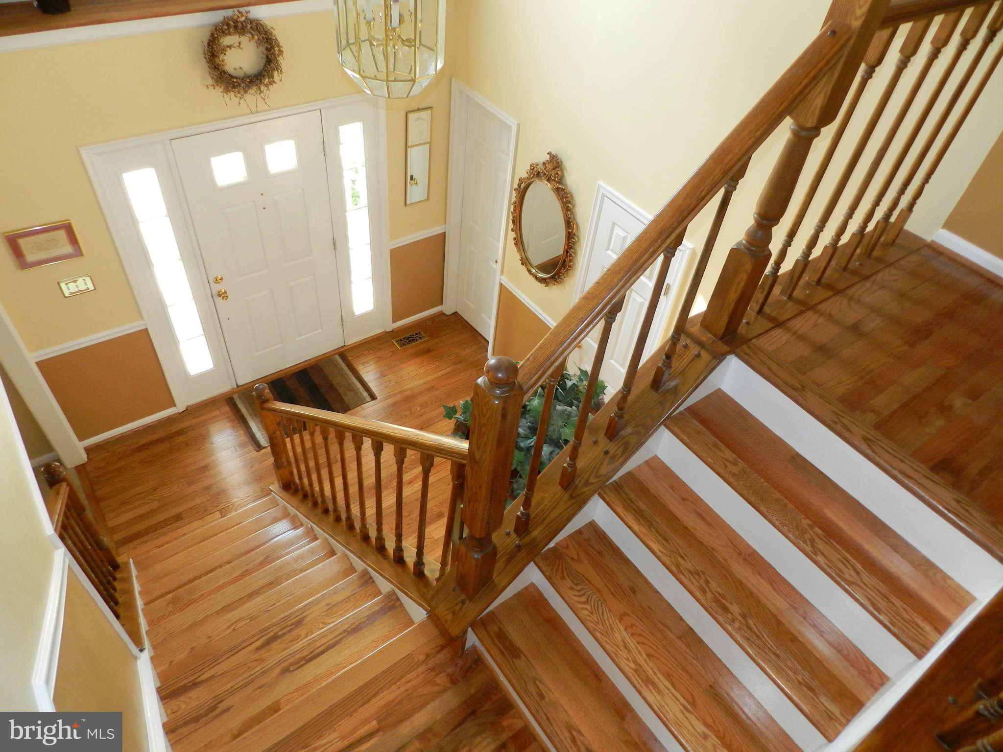 17224 Spates Hill Road Poolesville, MD 20837 - Photo 5 of 30 a view of a balcony with wooden floor