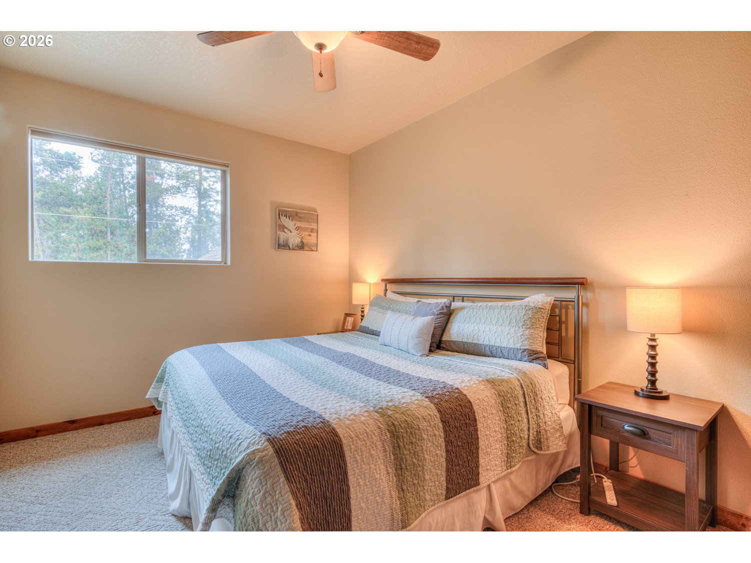 56340 Solar Drive Bend, OR 97707 - Photo 32 of 40 a bedroom with a bed and window