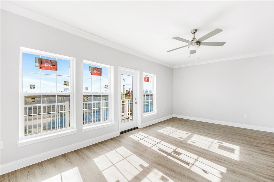 14814 Whitecap Boulevard Corpus Christi, TX 78418 - Photo 14 of 40 a view of an empty room with a window