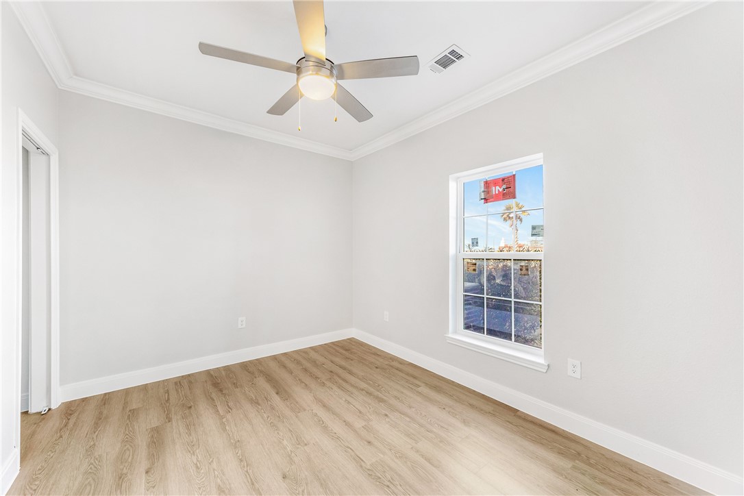 14814 Whitecap Boulevard Corpus Christi, TX 78418 - Photo 16 of 40 an empty room with windows