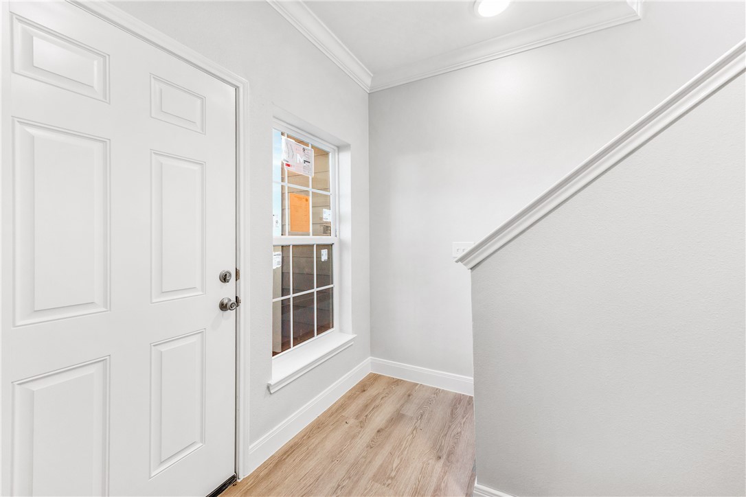 14814 Whitecap Boulevard Corpus Christi, TX 78418 - Photo 19 of 40 a view of small space with wooden floor and entryway