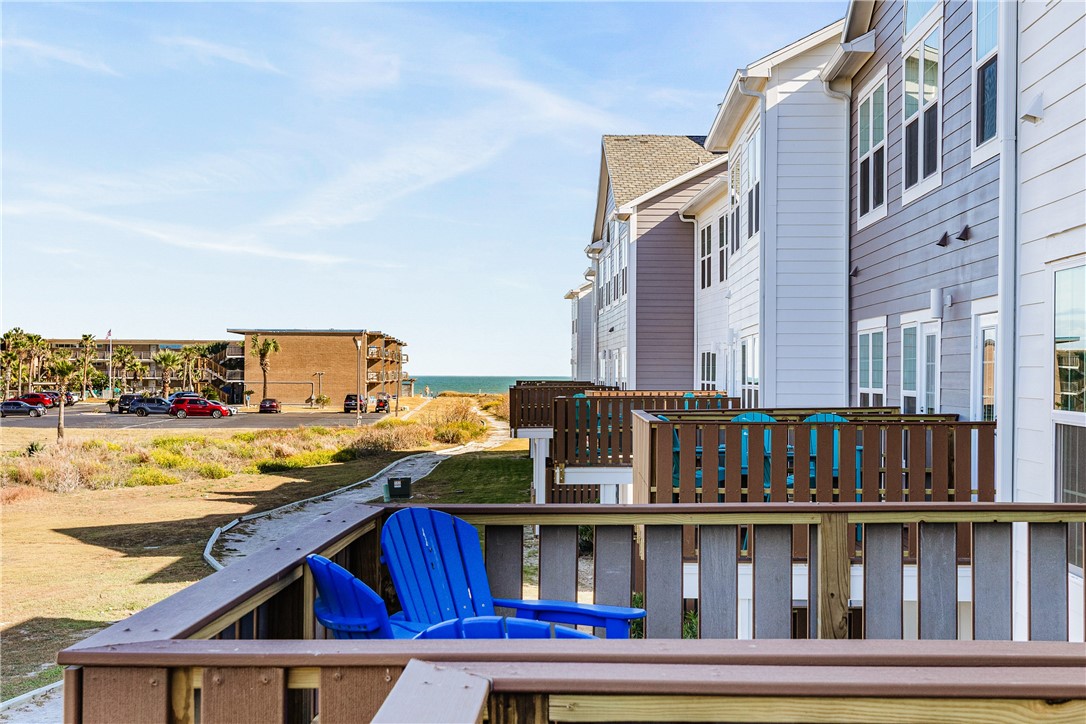 14814 Whitecap Boulevard Corpus Christi, TX 78418 - Photo 34 of 40 a balcony with an outdoor seating