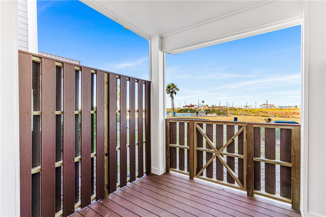 14814 Whitecap Boulevard Corpus Christi, TX 78418 - Photo 35 of 40 a view of a balcony with wooden floor