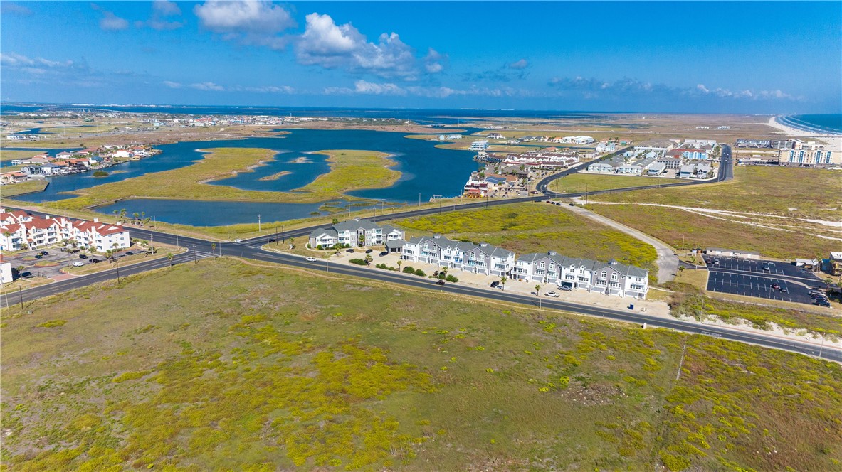 14814 Whitecap Boulevard Corpus Christi, TX 78418 - Photo 38 of 40 a view of an ocean and a building
