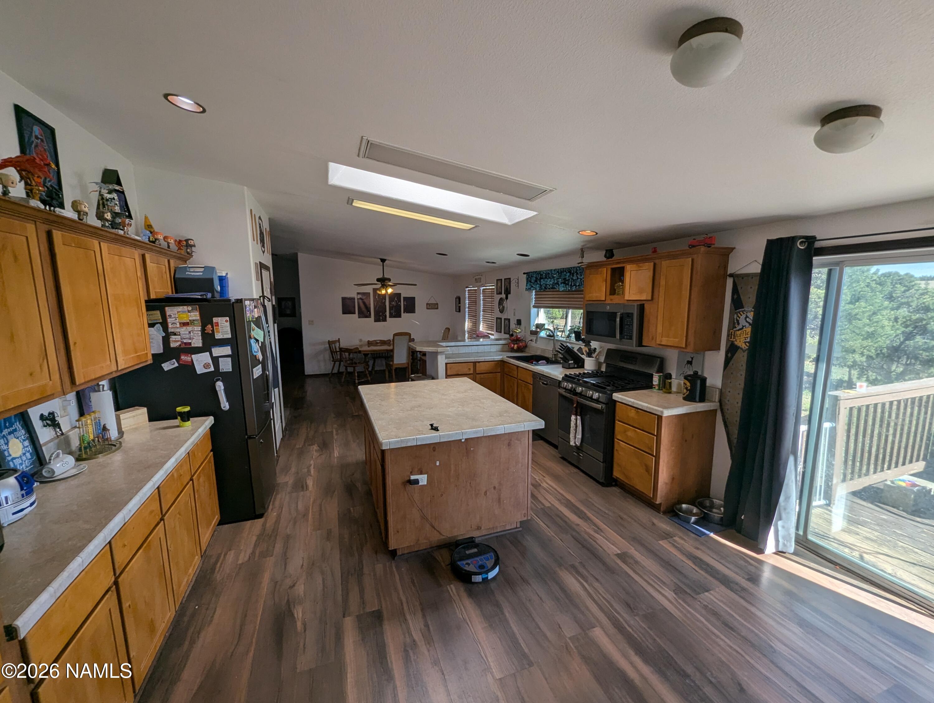2186 East Clear Point Way Williams, AZ 86046 - Photo 12 of 43 a kitchen with a sink appliances and wooden floor