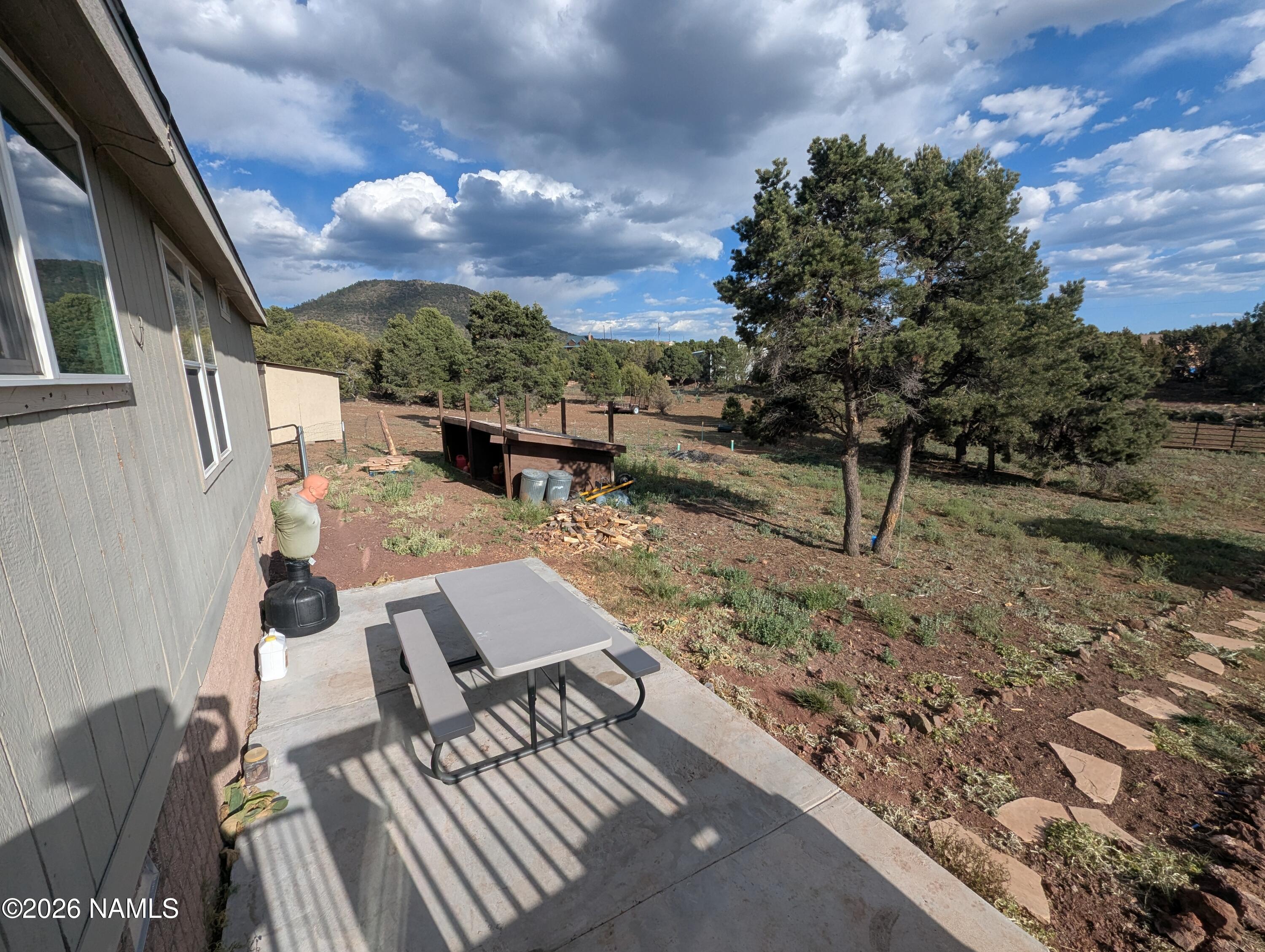 2186 East Clear Point Way Williams, AZ 86046 - Photo 38 of 43 a view of outdoor space yard deck patio and outdoor kitchen