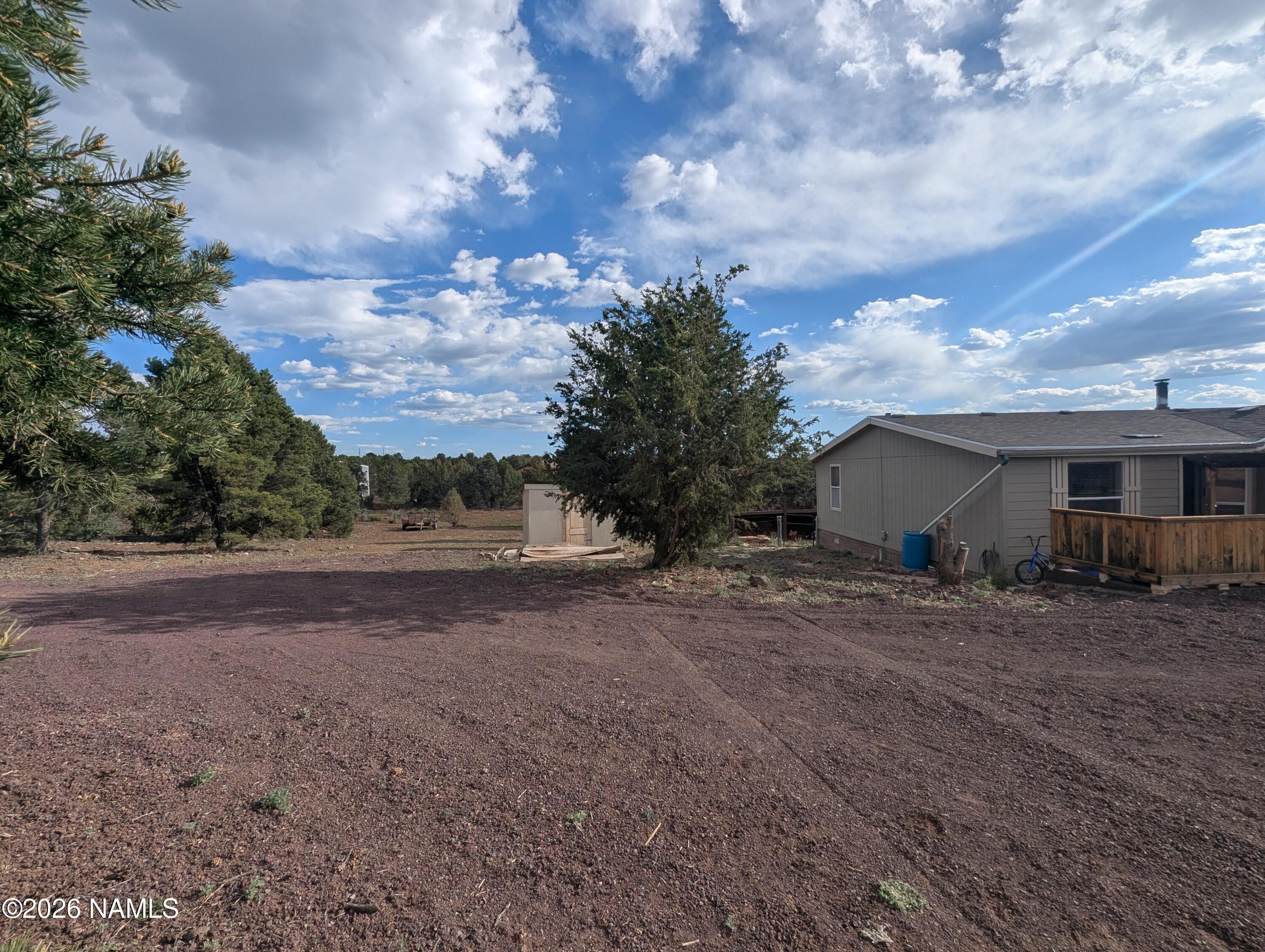 2186 East Clear Point Way Williams, AZ 86046 - Photo 39 of 43 a view of a house with a yard