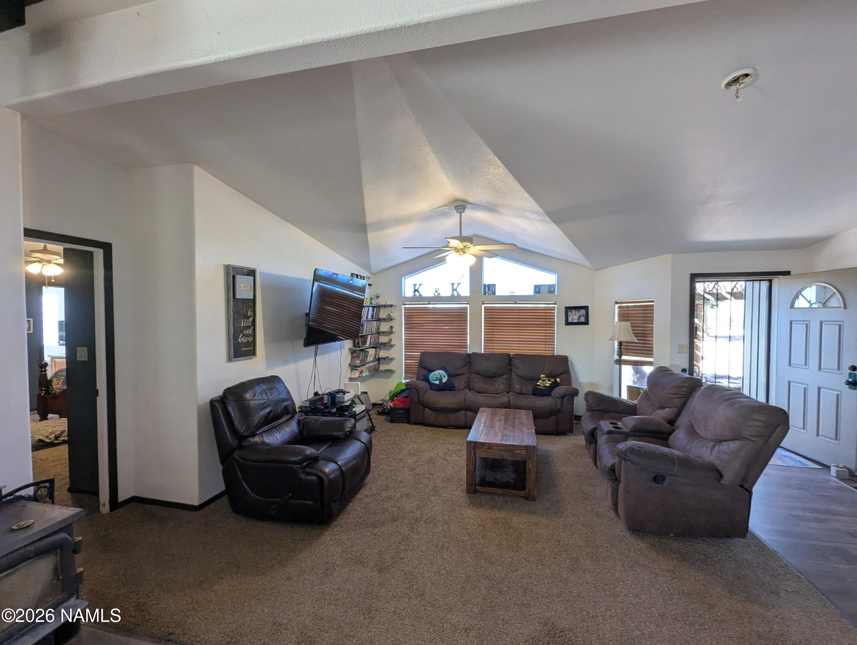 2186 East Clear Point Way Williams, AZ 86046 - Photo 5 of 43 a living room with furniture and a large window