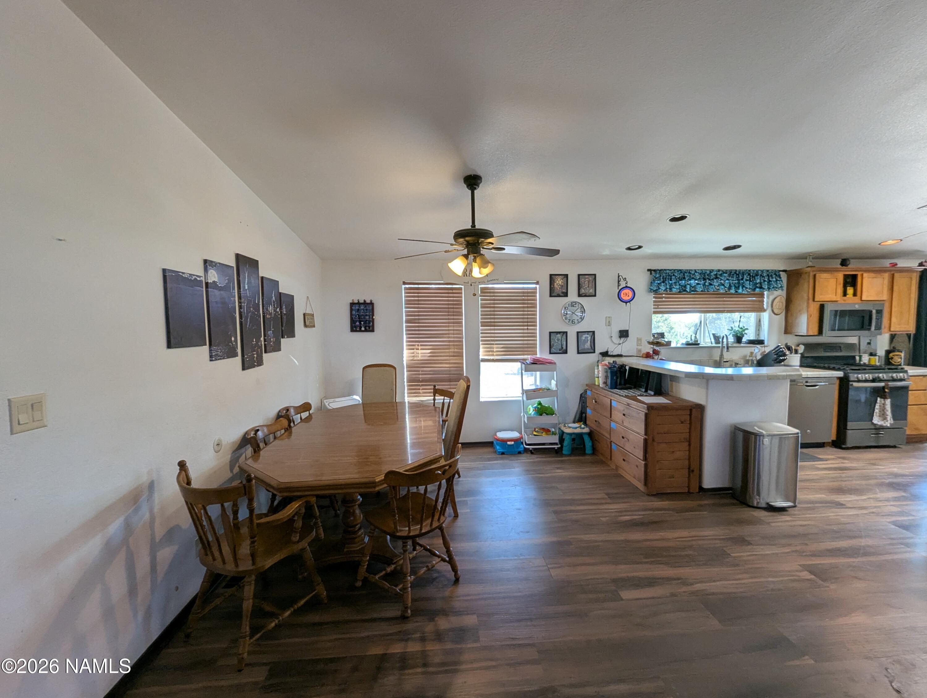 2186 East Clear Point Way Williams, AZ 86046 - Photo 8 of 43 a view of a dining room with furniture