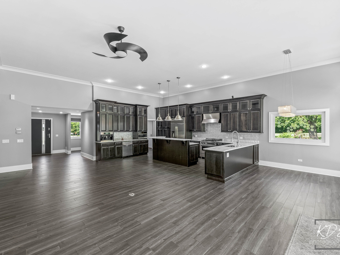27W320 80th Street Naperville, IL 60565 - Photo 14 of 37 a living room with furniture and view of kitchen
