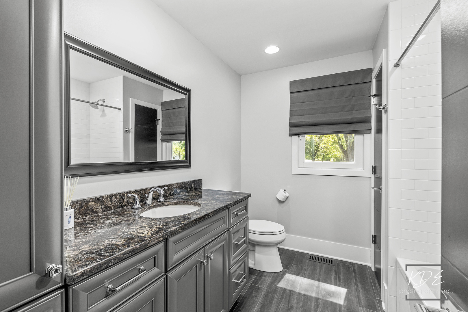 27W320 80th Street Naperville, IL 60565 - Photo 22 of 37 a bathroom with a granite countertop sink toilet and shower