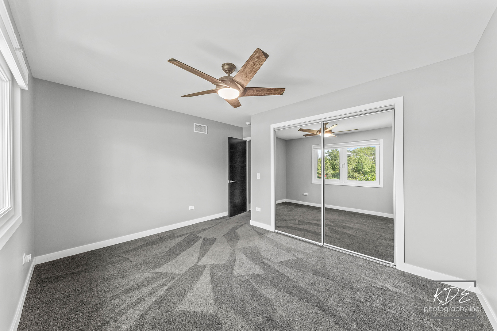 27W320 80th Street Naperville, IL 60565 - Photo 23 of 37 an empty room with windows and entrance